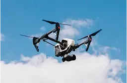 Drone flying blue sky